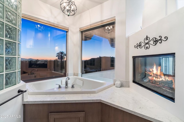 bathroom featuring a chandelier