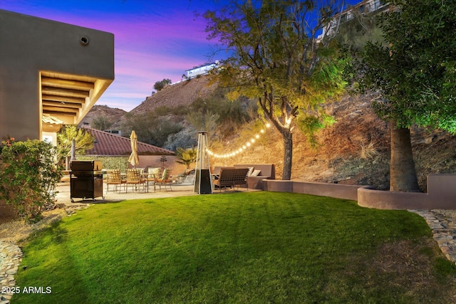 yard at dusk with a mountain view