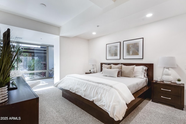 carpeted bedroom with access to outside and recessed lighting