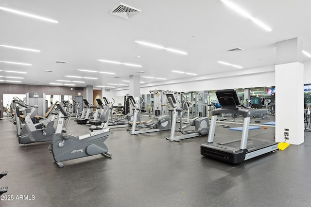 exercise room featuring visible vents