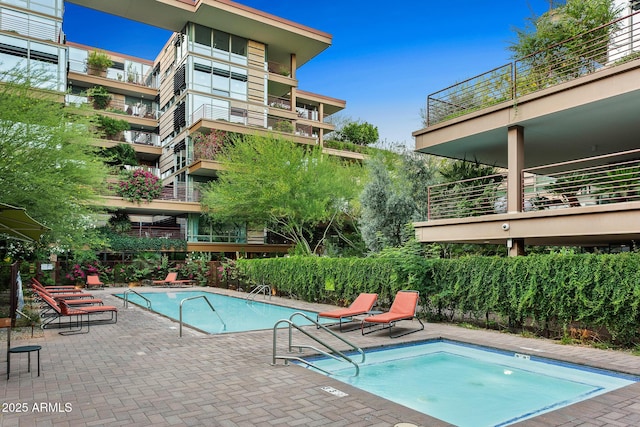 pool with a patio