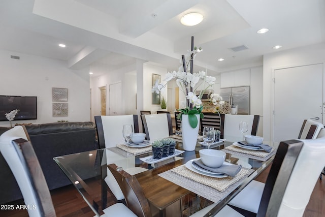 dining room featuring recessed lighting, visible vents, and wood finished floors