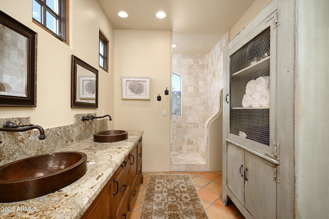 40039 N 107th Pl, Scottsdale, AZ 85262 - full bath with double vanity, a walk in shower, tile patterned flooring, and recessed lighting