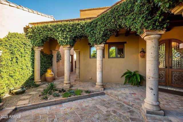 40039 N 107th Pl, Scottsdale, AZ 85262 - property entrance featuring stucco siding, a patio, and french doors