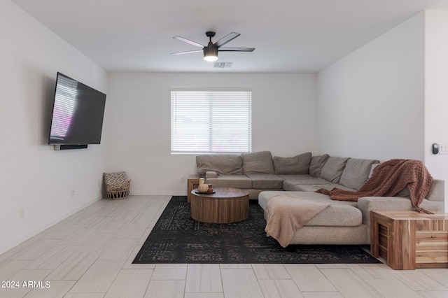 living room with ceiling fan