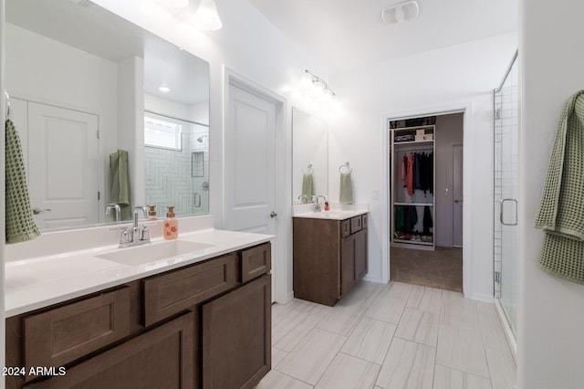 bathroom with vanity and walk in shower