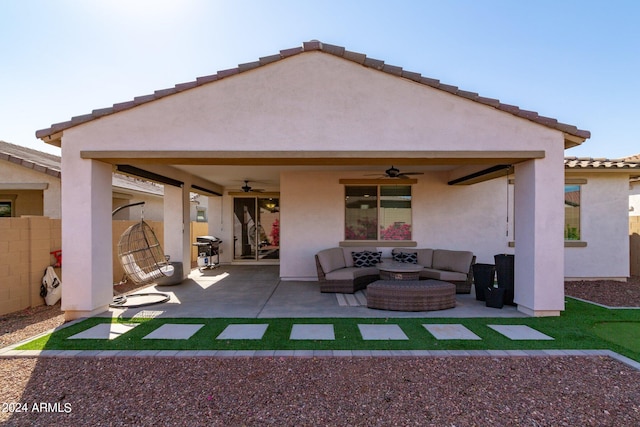 back of house featuring a patio, ceiling fan, and an outdoor hangout area