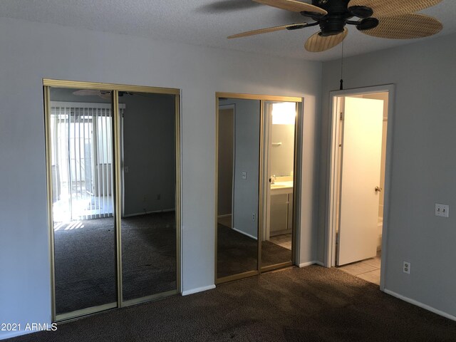 4042 E Carson Rd, Phoenix, AZ 85042 - unfurnished bedroom with multiple closets, carpet floors, and ensuite bathroom