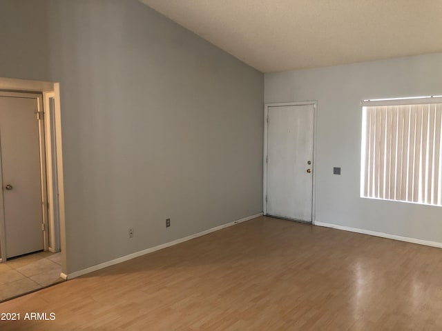 4042 E Carson Rd, Phoenix, AZ 85042 - spare room with light wood finished floors