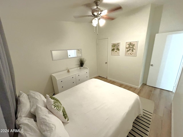 bedroom featuring ceiling fan and light wood finished floors