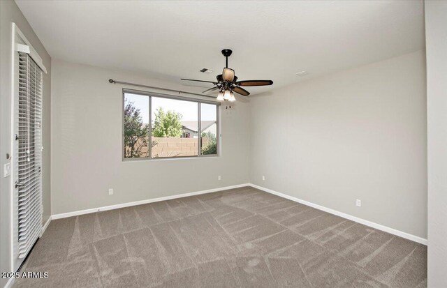 7769 E Lavender Loop, Prescott Valley, AZ 86315 - unfurnished bedroom featuring carpet flooring, baseboards, and ceiling fan