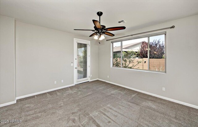7769 E Lavender Loop, Prescott Valley, AZ 86315 - spare room with carpet, baseboards, and a ceiling fan