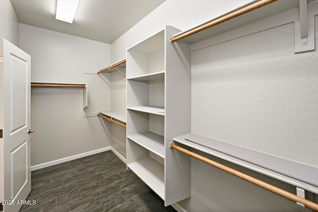 7769 E Lavender Loop, Prescott Valley, AZ 86315 - spacious closet with dark wood-type flooring