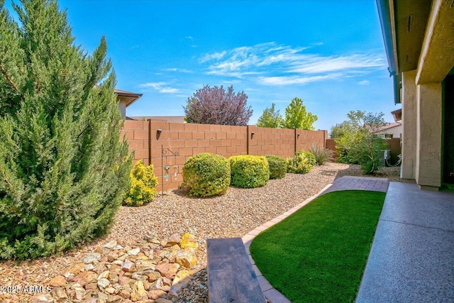 7769 E Lavender Loop, Prescott Valley, AZ 86315 - fenced backyard featuring a patio area
