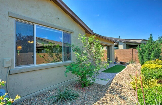 7769 E Lavender Loop, Prescott Valley, AZ 86315 - view of property exterior with stucco siding