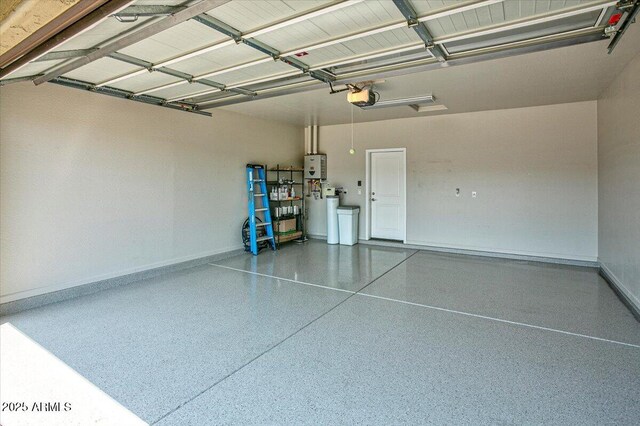 7769 E Lavender Loop, Prescott Valley, AZ 86315 - garage with a garage door opener and baseboards