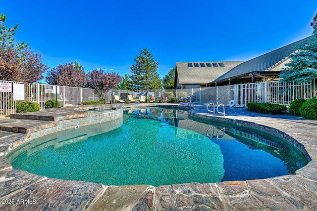 7769 E Lavender Loop, Prescott Valley, AZ 86315 - view of swimming pool featuring a pool with connected hot tub