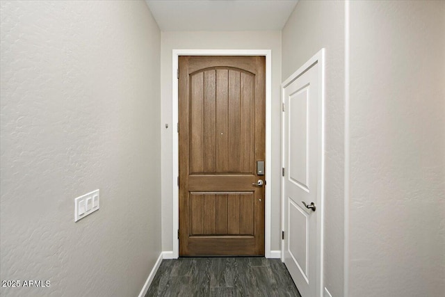 7769 E Lavender Loop, Prescott Valley, AZ 86315 - entryway with baseboards, dark wood-style flooring, and a textured wall