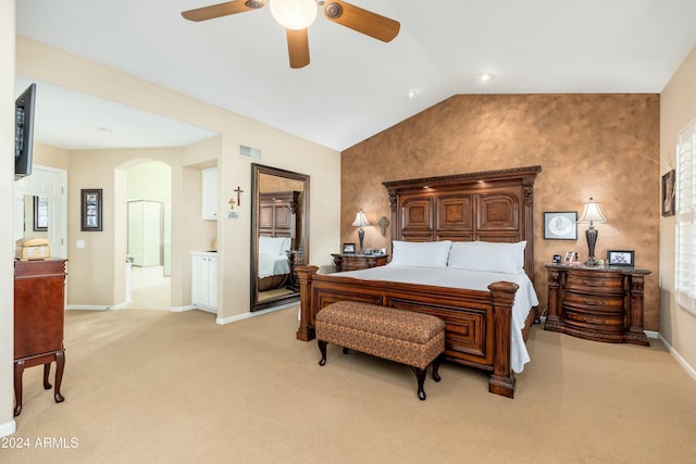 carpeted bedroom featuring vaulted ceiling and ceiling fan