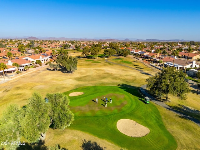 birds eye view of property with a mountain view