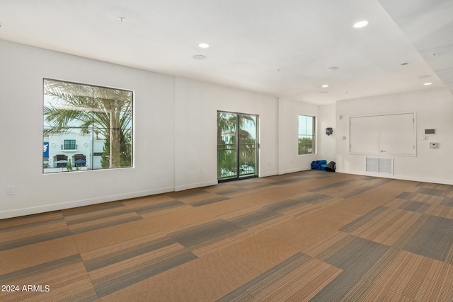 spare room featuring carpet flooring