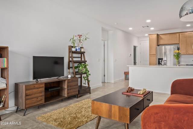 living room with light tile floors