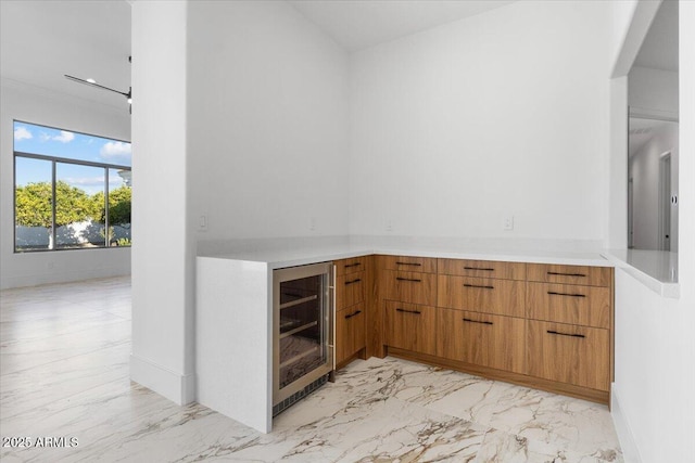 3354 E Jaeger Cir, Mesa, AZ 85213 - indoor dry bar with wine cooler and light marble finish flooring