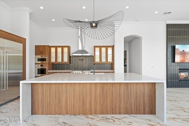 3354 E Jaeger Cir, Mesa, AZ 85213 - kitchen with stainless steel built in refrigerator, light marble finish floors, wall chimney exhaust hood, arched walkways, and recessed lighting