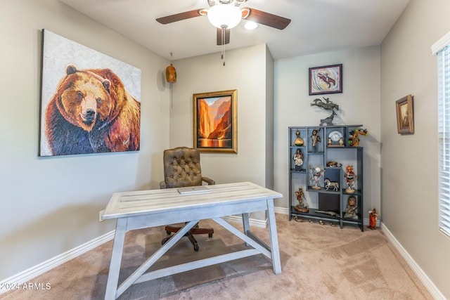 office area featuring ceiling fan and carpet floors