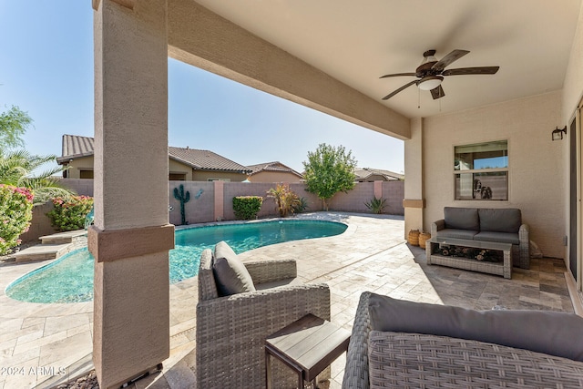 view of pool featuring a patio area, ceiling fan, and outdoor lounge area