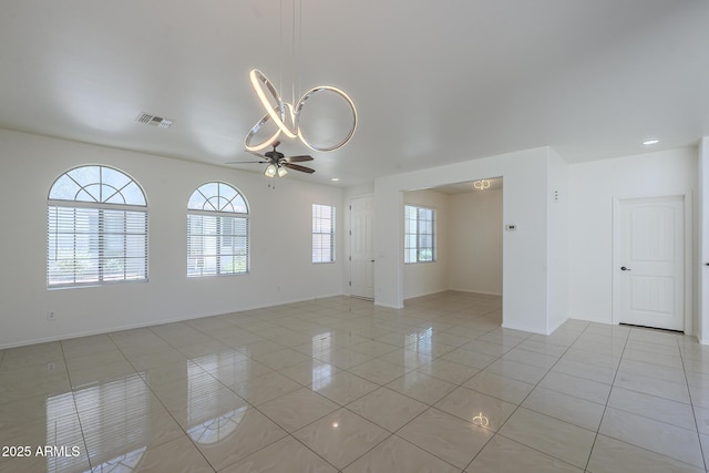 3451 S Wren Dr, Gilbert, AZ 85297 - empty room featuring ceiling fan and light tile patterned flooring