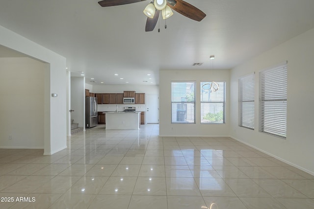 3451 S Wren Dr, Gilbert, AZ 85297 - unfurnished living room featuring light tile patterned flooring, ceiling fan, recessed lighting, and stairs