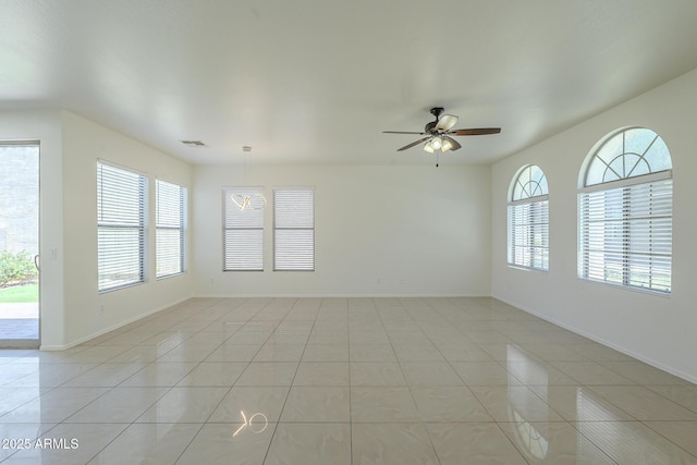 3451 S Wren Dr, Gilbert, AZ 85297 - spare room with light tile patterned flooring and ceiling fan