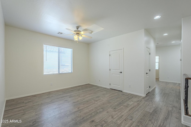 3451 S Wren Dr, Gilbert, AZ 85297 - unfurnished room with ceiling fan, light wood-type flooring, and recessed lighting