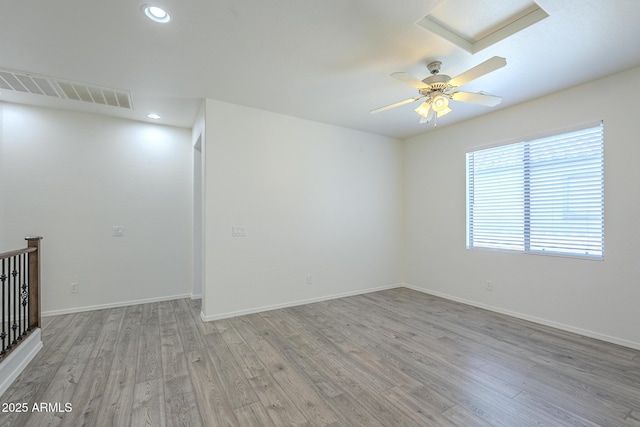 3451 S Wren Dr, Gilbert, AZ 85297 - empty room with light wood-type flooring, recessed lighting, and a ceiling fan