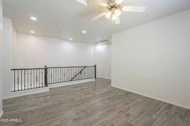 3451 S Wren Dr, Gilbert, AZ 85297 - spare room featuring wood finished floors, recessed lighting, and ceiling fan