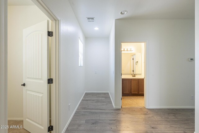 3451 S Wren Dr, Gilbert, AZ 85297 - corridor with wood finished floors and recessed lighting