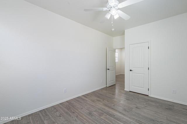 3451 S Wren Dr, Gilbert, AZ 85297 - spare room with wood finished floors and a ceiling fan