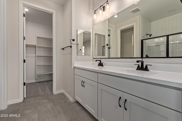 bathroom with vanity and walk in shower