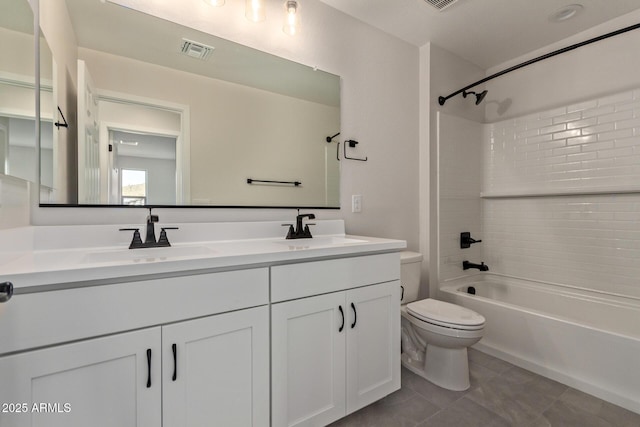 full bathroom with tile patterned flooring, vanity, shower / bathtub combination, and toilet