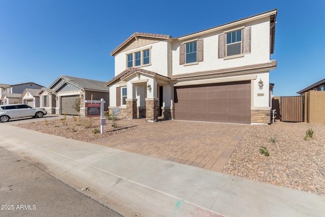 view of front of property featuring a garage