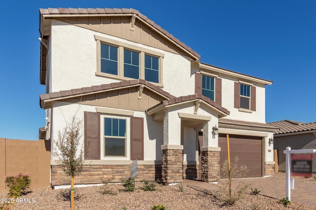 view of front of home with a garage