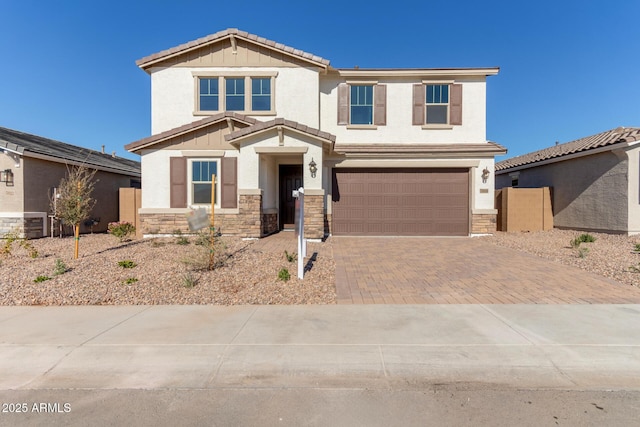 view of front of property with a garage