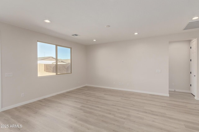 empty room featuring light hardwood / wood-style flooring