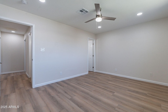 1210 W La Jolla Dr, Tempe, AZ 85282 - empty room featuring wood finished floors, a ceiling fan, recessed lighting, and a smoke detector