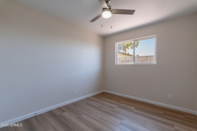 1210 W La Jolla Dr, Tempe, AZ 85282 - empty room featuring wood finished floors and ceiling fan