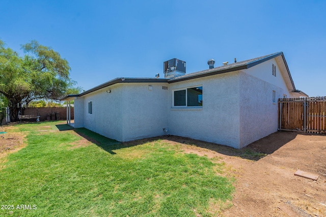 1210 W La Jolla Dr, Tempe, AZ 85282 - back of house featuring a fenced backyard and stucco siding