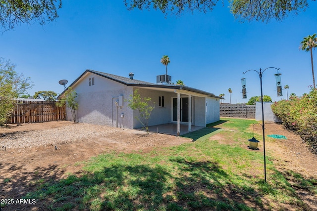 1210 W La Jolla Dr, Tempe, AZ 85282 - rear view of house with stucco siding and a patio area