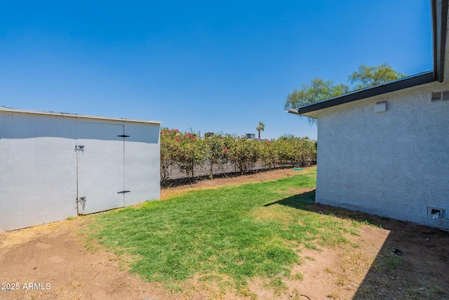 1210 W La Jolla Dr, Tempe, AZ 85282 - view of green lawn with a storage shed