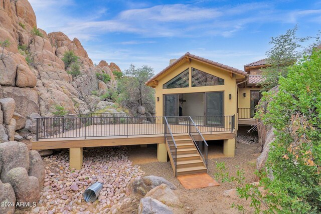 4393 N Twisted Trl, Prescott, AZ 86301 - back of house with stairs, a wooden deck, a tiled roof, and stucco siding